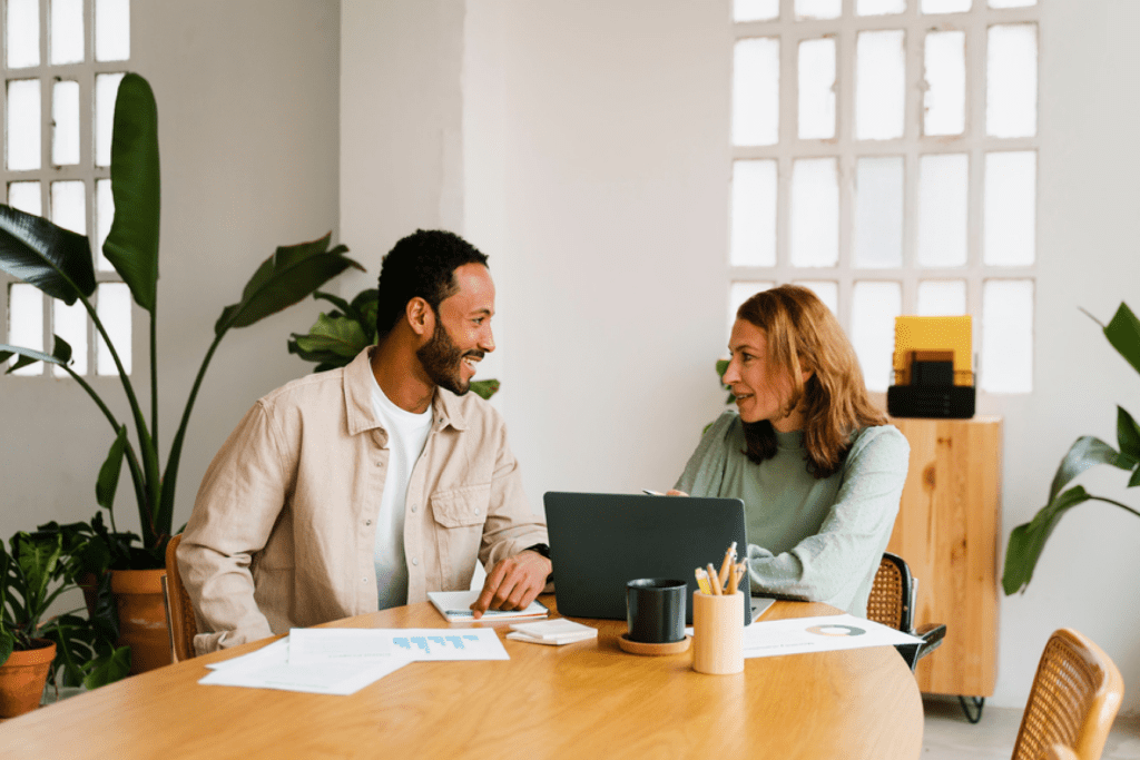 An investor reviewing a Schedule K-1 with their tax advisor