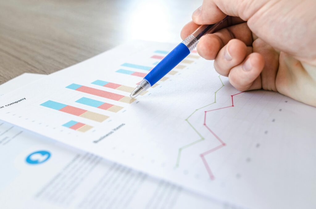 Photo of spreadsheet with bar charts.