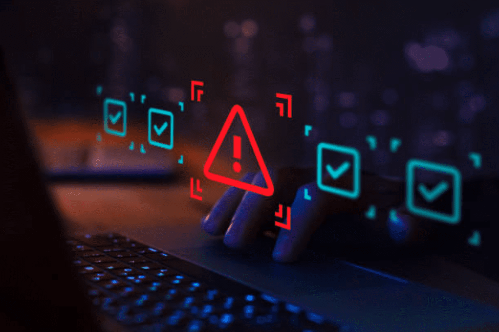 Red warning alert on a digital screen signaling a security breach or compliance error.